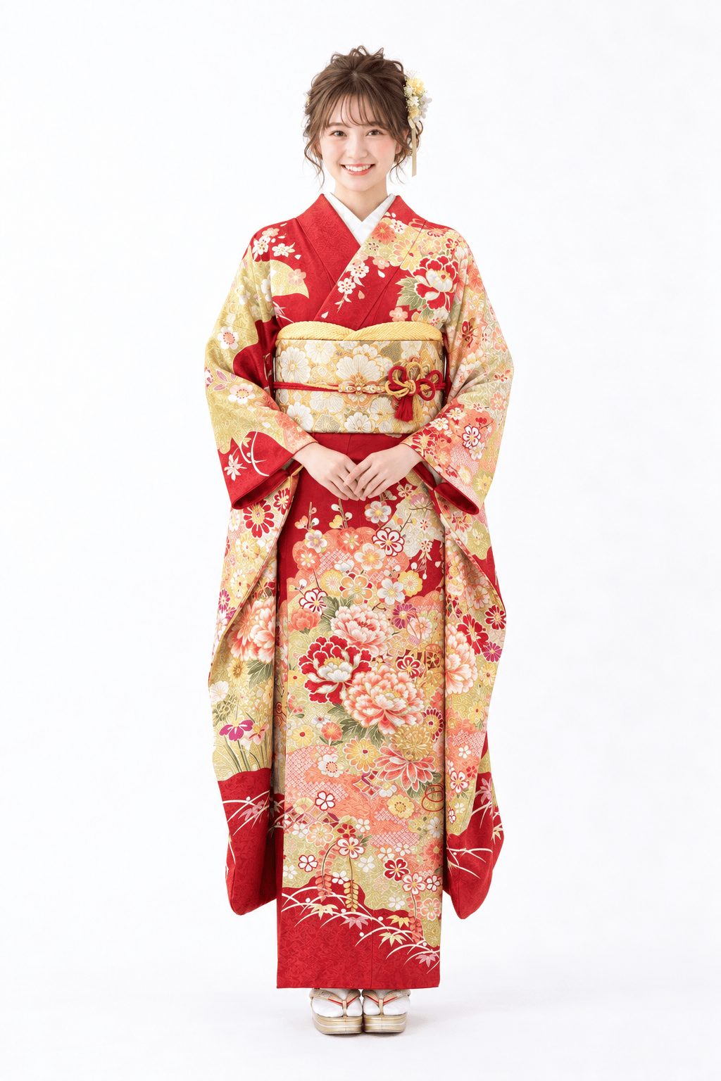 赤地に金色や珊瑚色の染め分けと、牡丹などの古典花柄が映える振袖姿。